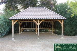 Timber framed building with staddle stones on each post