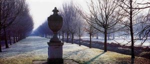 A bleak winter vista with a dramatic Chilstone Pope's urn and pedestal.