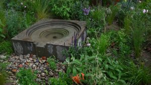 A repurposed concrete water feature. 